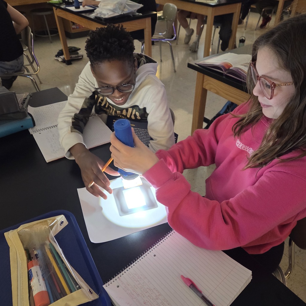 7th grade students investigating light waves