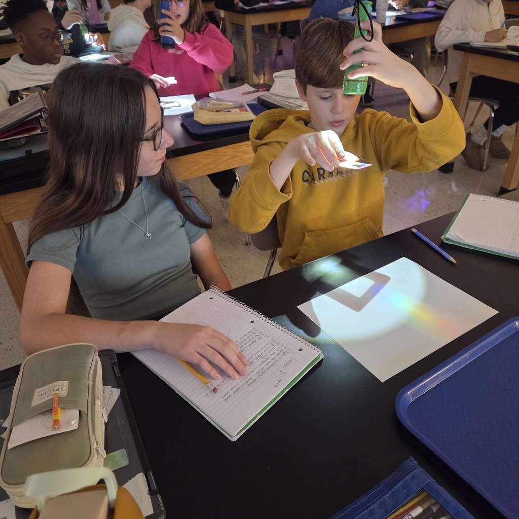 7th grade students investigating light waves