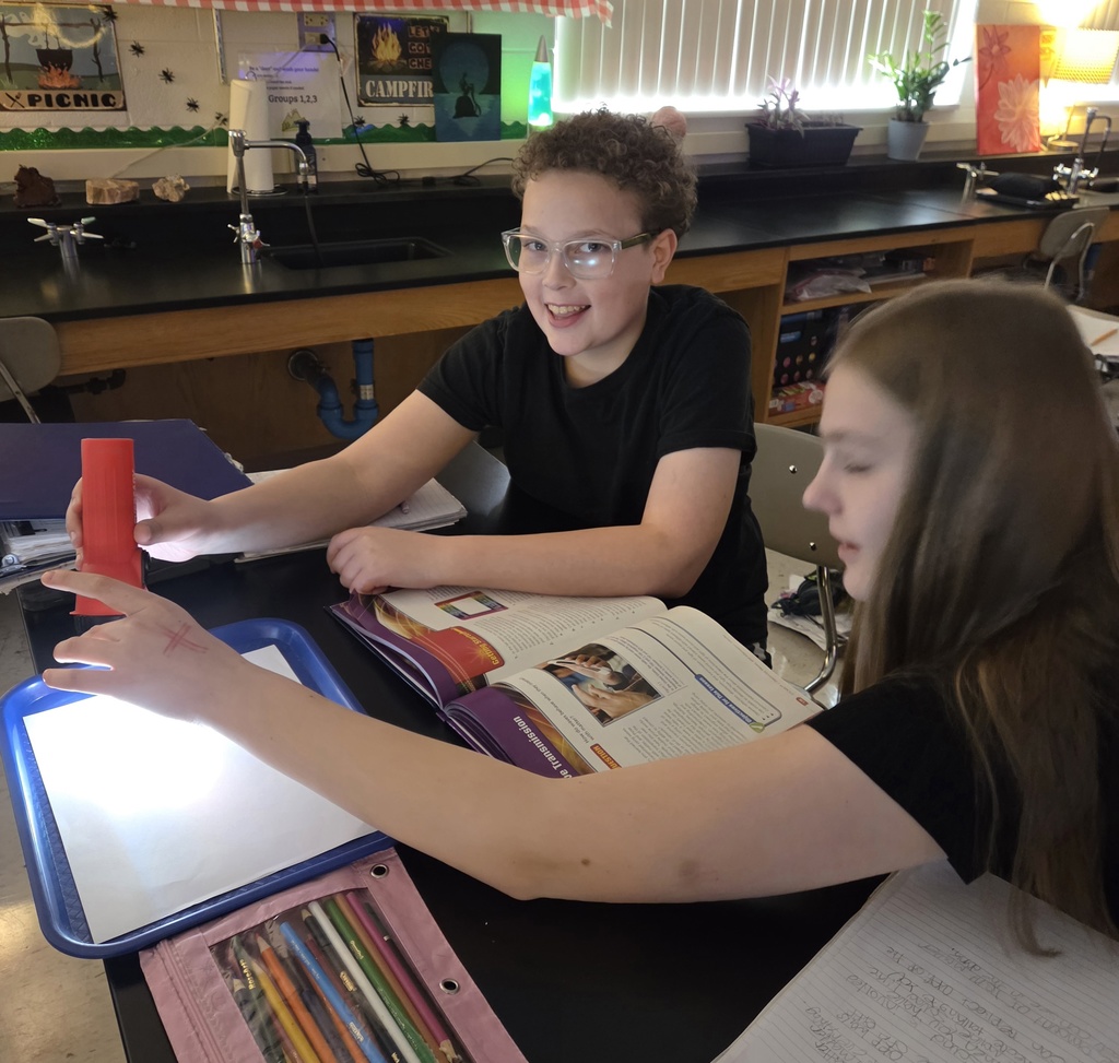 7th grade students investigating light waves