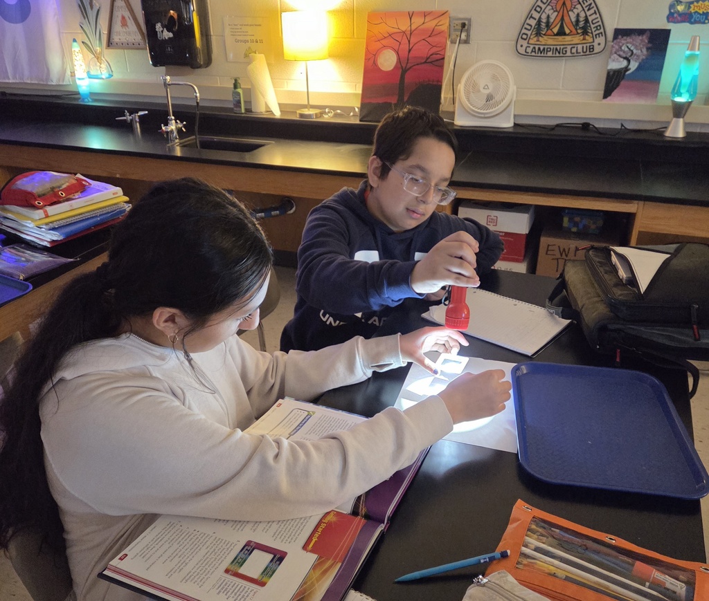 7th grade students investigating light waves