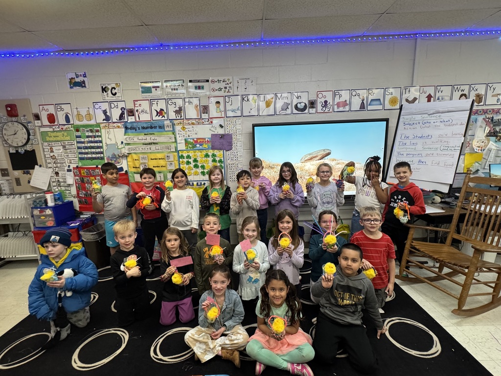 students with their hatched eggs