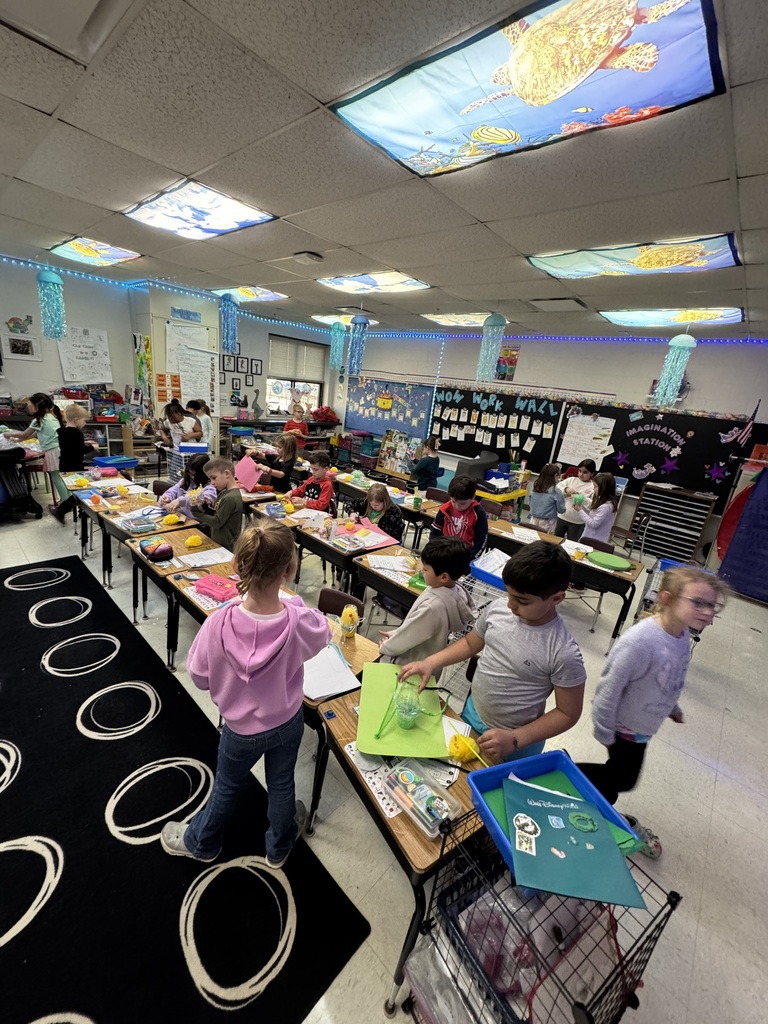 students with their hatched eggs
