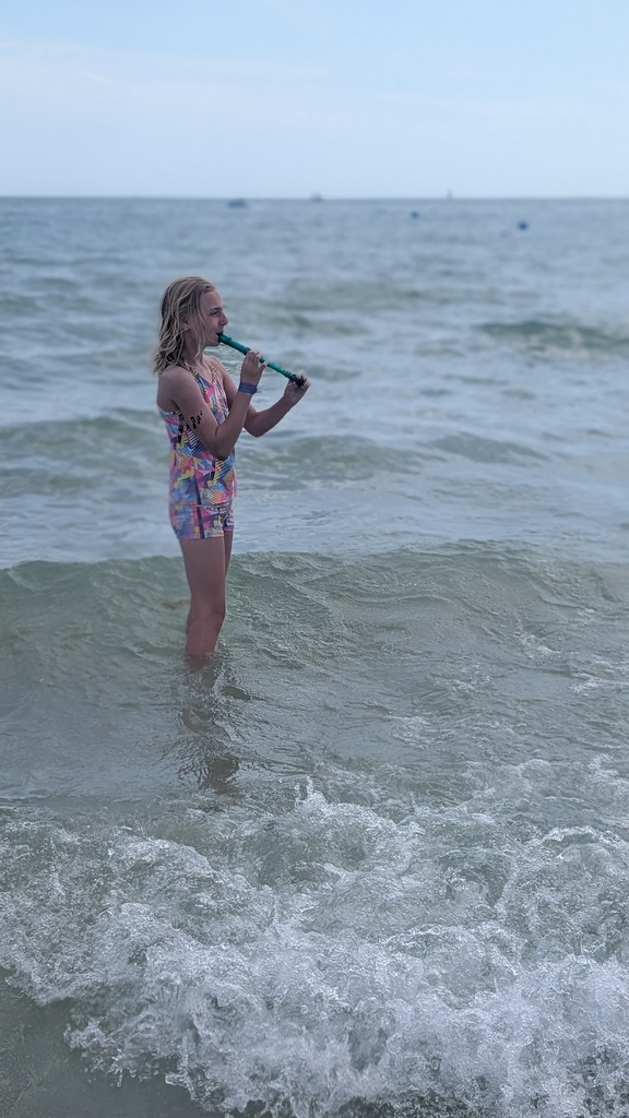 student playing recorder