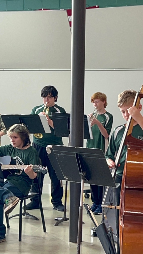 jazz band and percussion ensemble performing