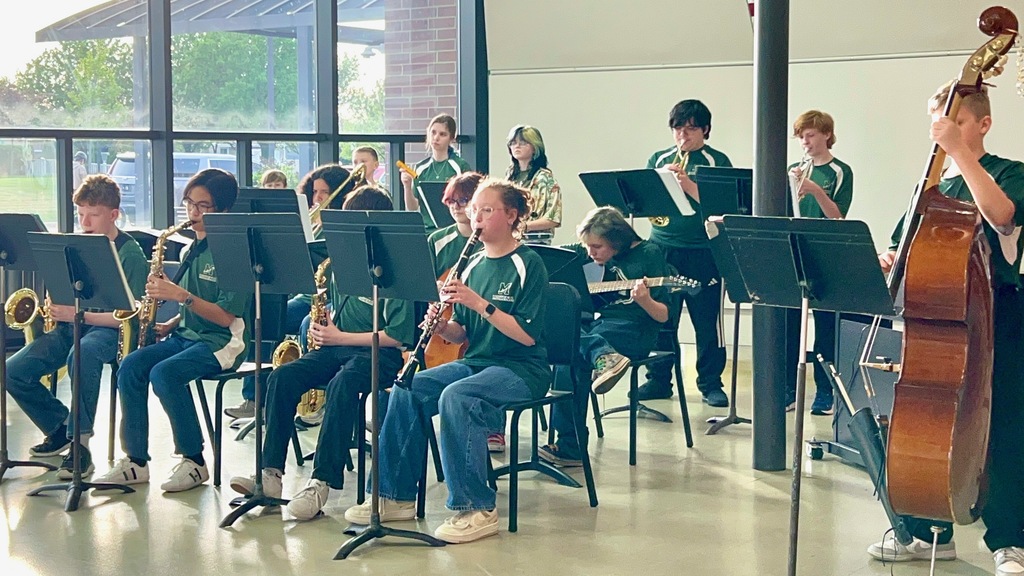 jazz band and percussion ensemble performing