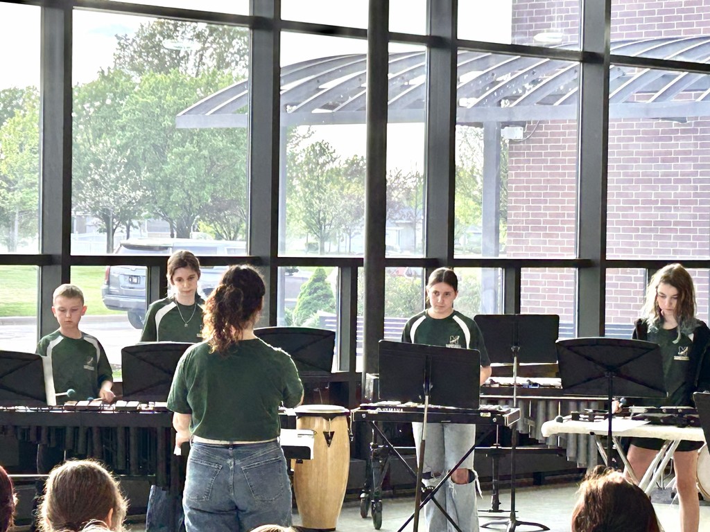 jazz band and percussion ensemble performing