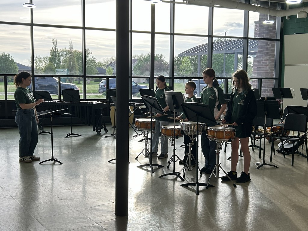 jazz band and percussion ensemble performing