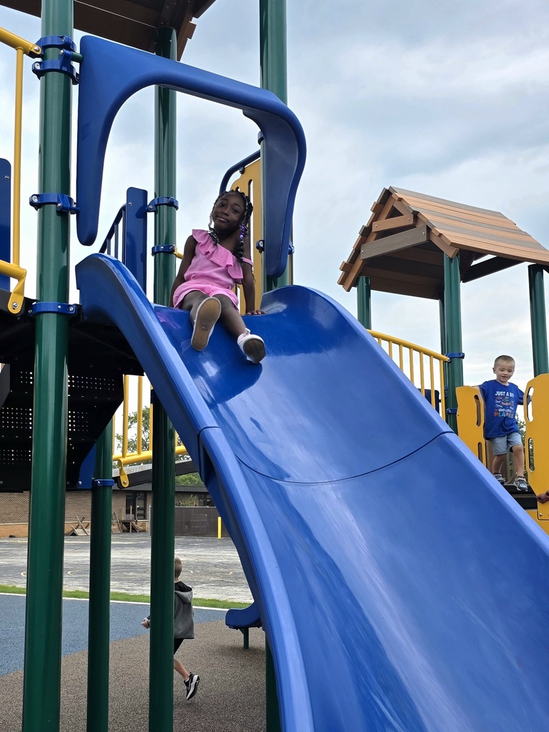 students playing on playground at recess