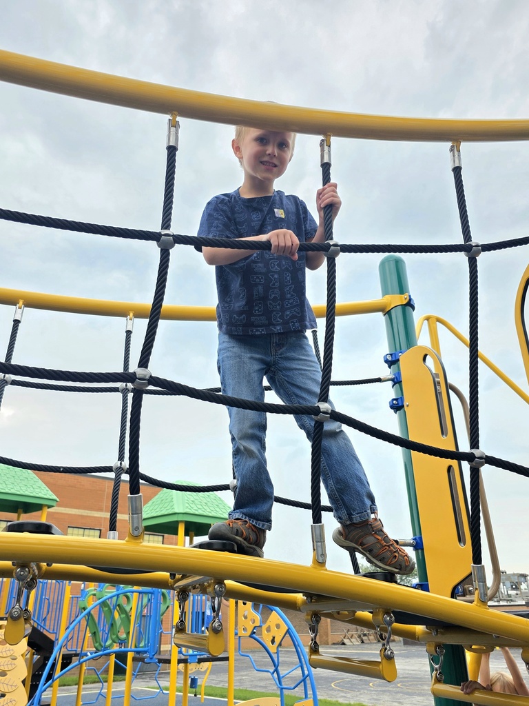 students playing on playground at recess