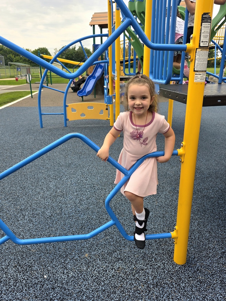 students playing on playground at recess