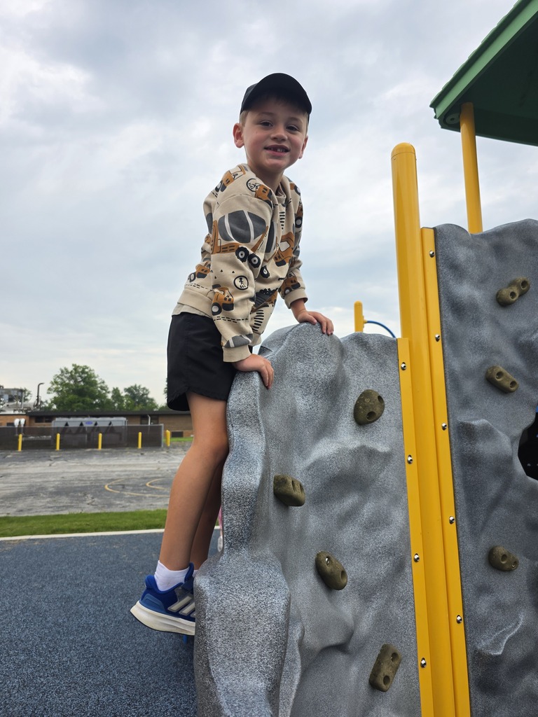 students playing on playground at recess