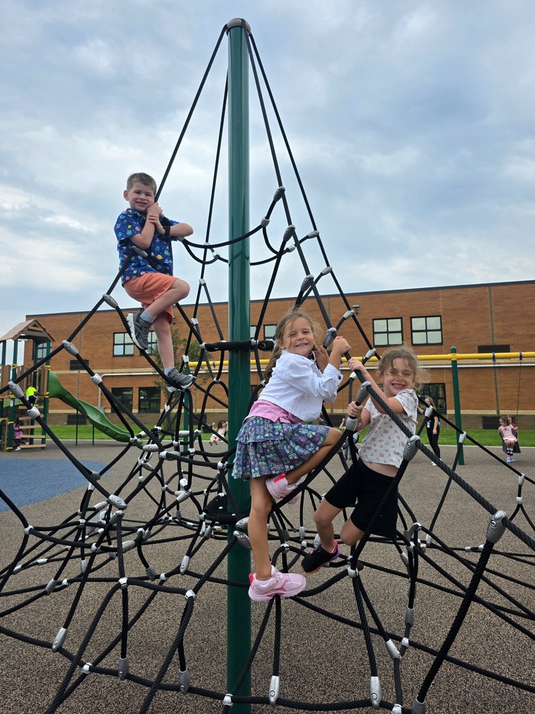 students playing on playground at recess