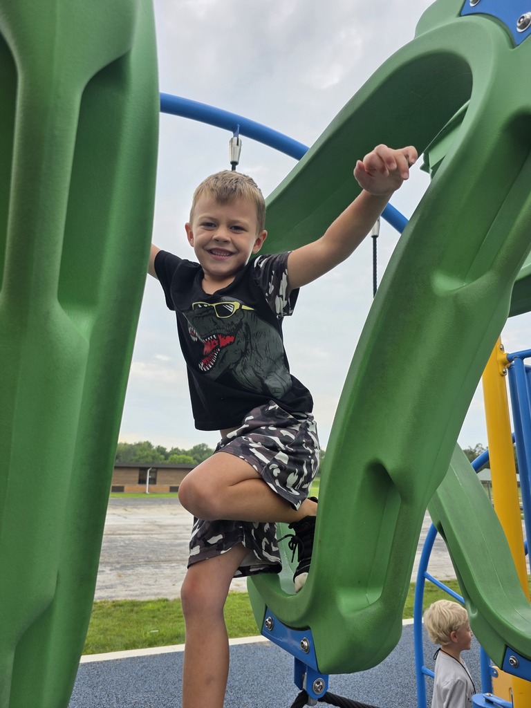 students playing on playground at recess