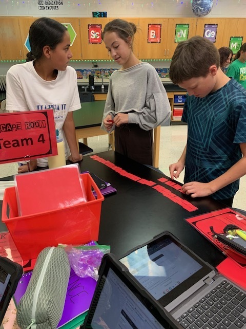 students doing the escape room