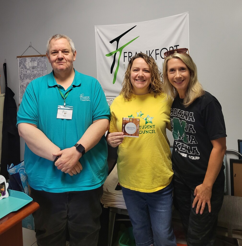 teachers with the food pantry director