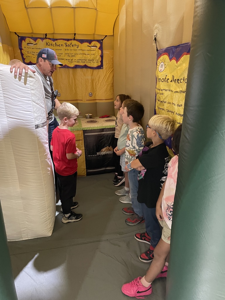students with the fire house
