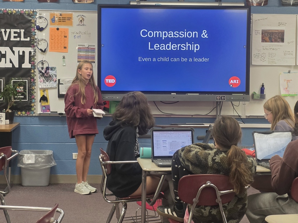 student giving a ted talk to classmates