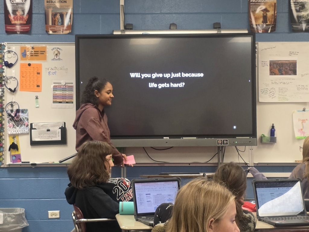 student giving a ted talk to classmates