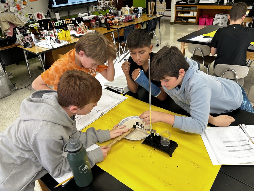 students measuring gravitational pull