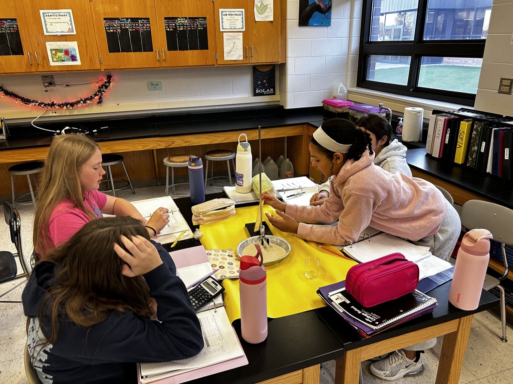 students measuring gravitational pull