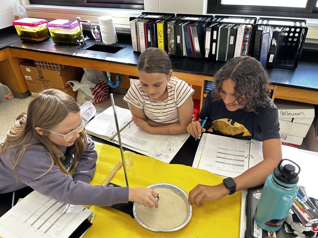 students measuring gravitational pull