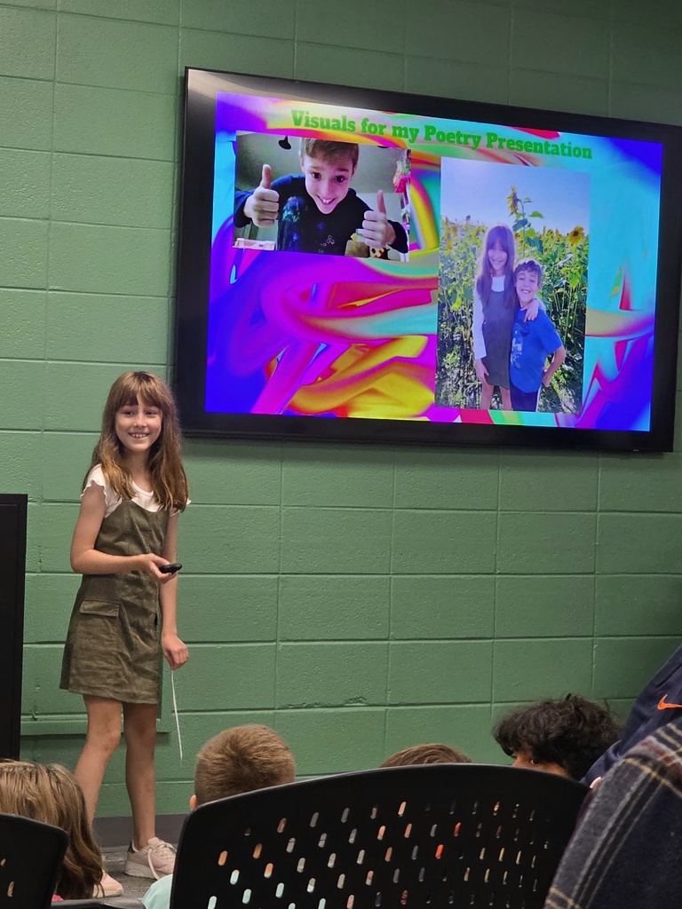 students presenting their poetry