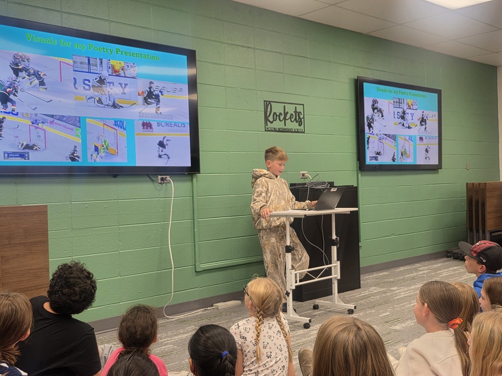 students presenting their poetry