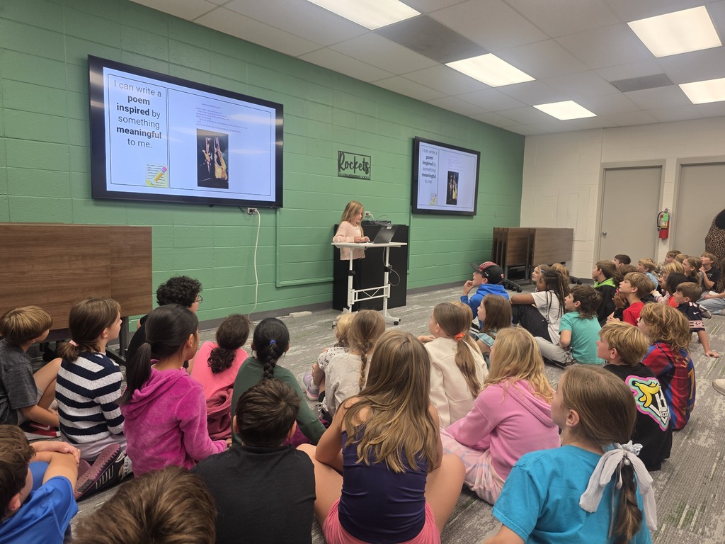 students presenting their poetry