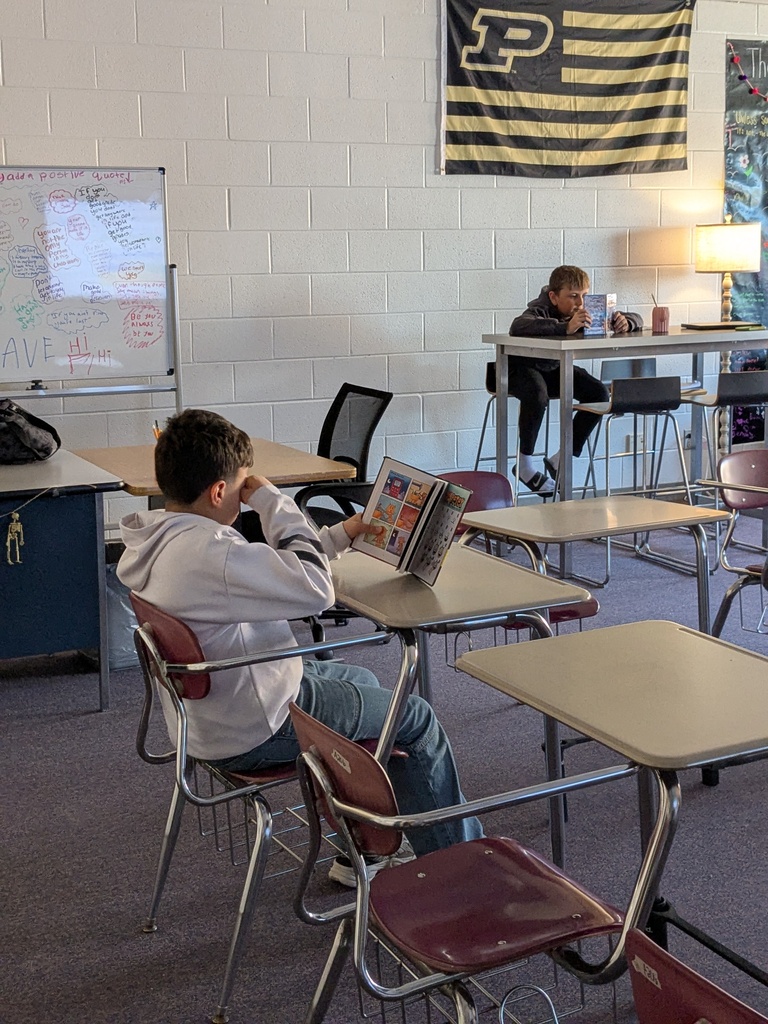 students reading books