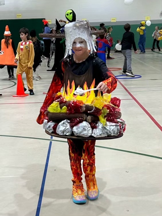 students and teachers wearing costumes