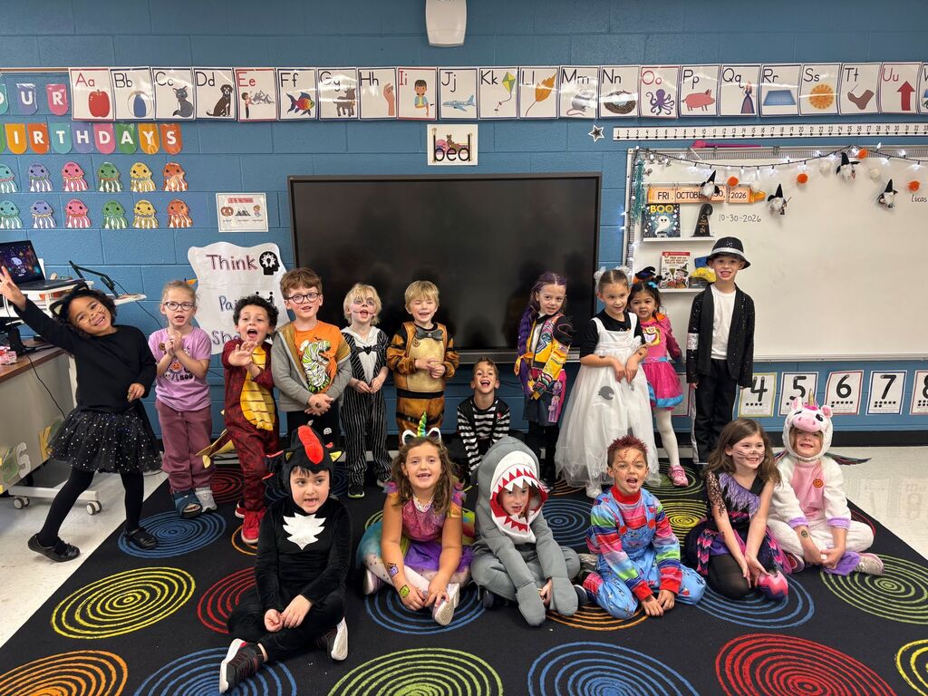 students and teachers wearing costumes