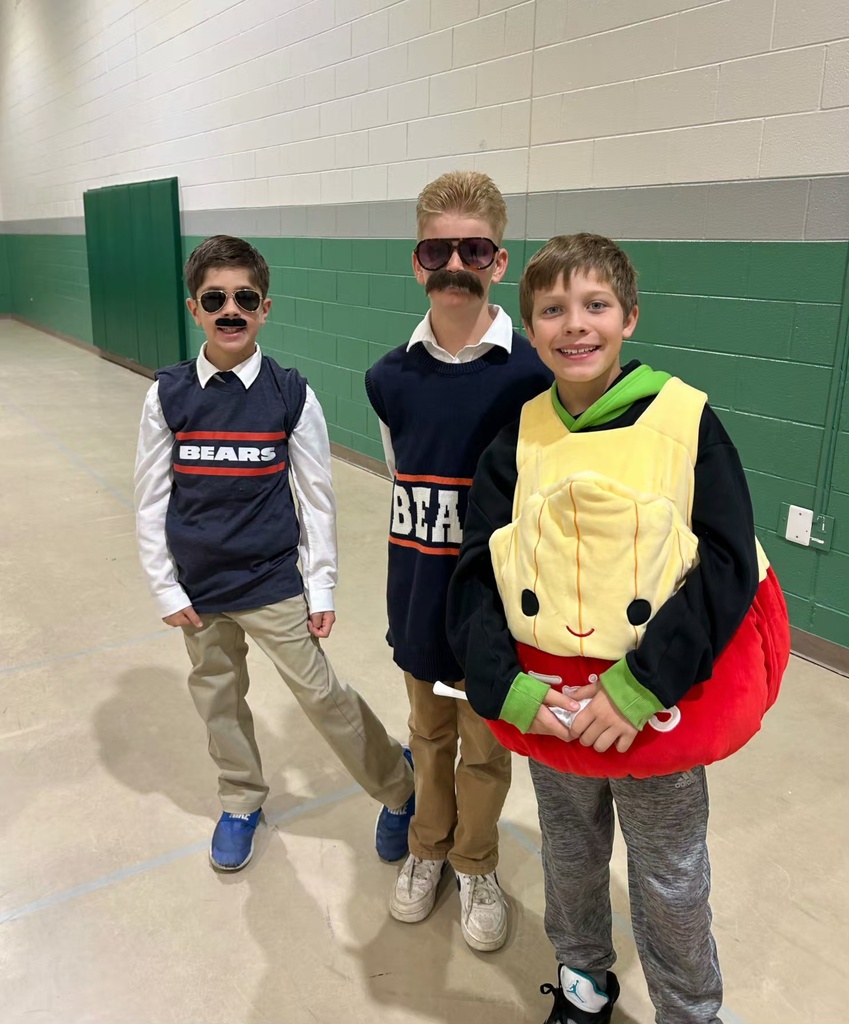 students and teachers wearing costumes
