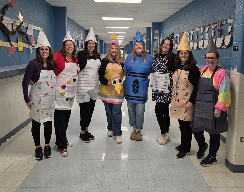 students and teachers wearing costumes