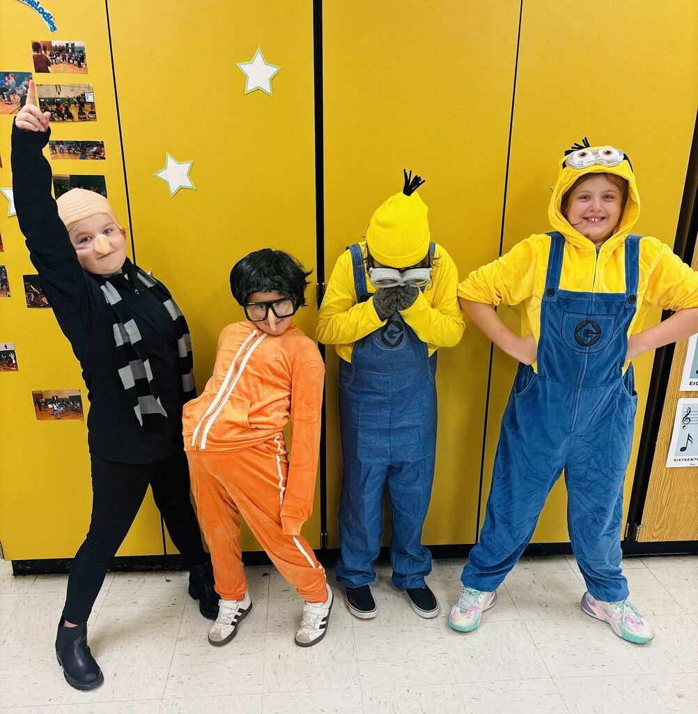 students and teachers wearing costumes