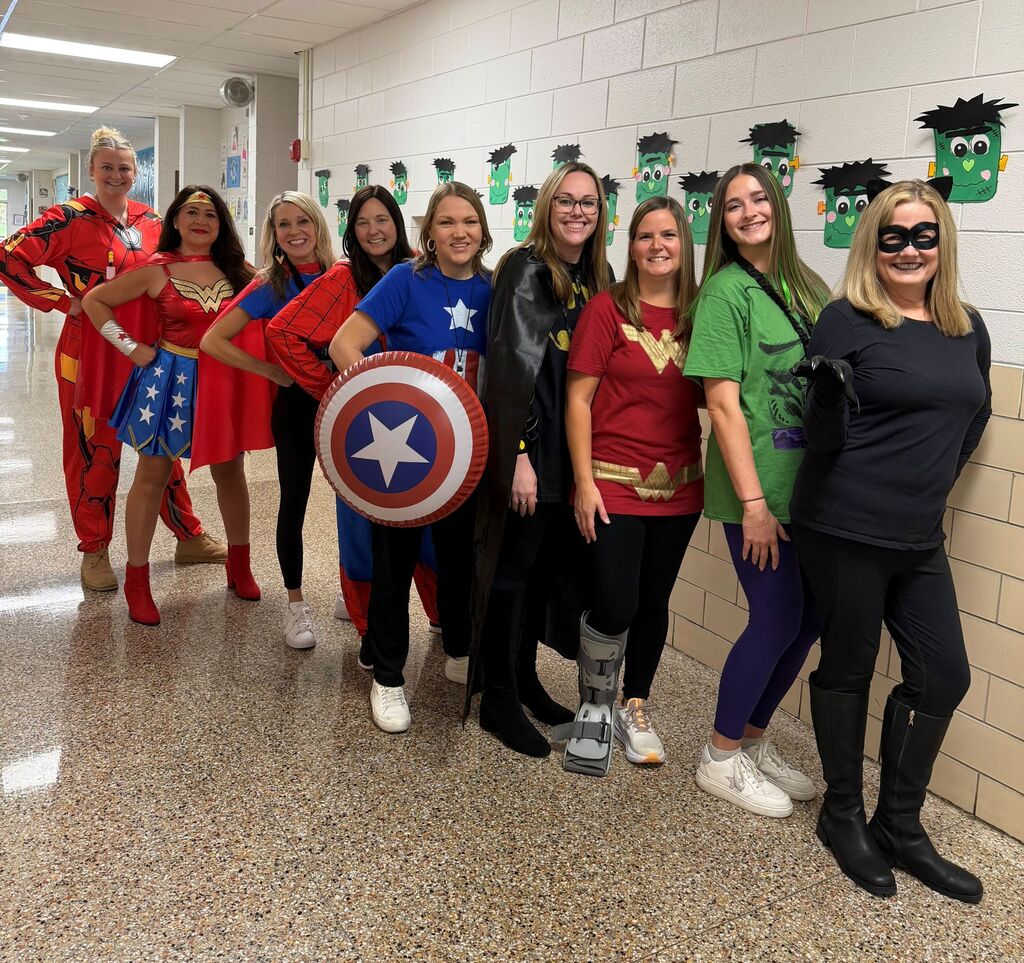 students and teachers wearing costumes
