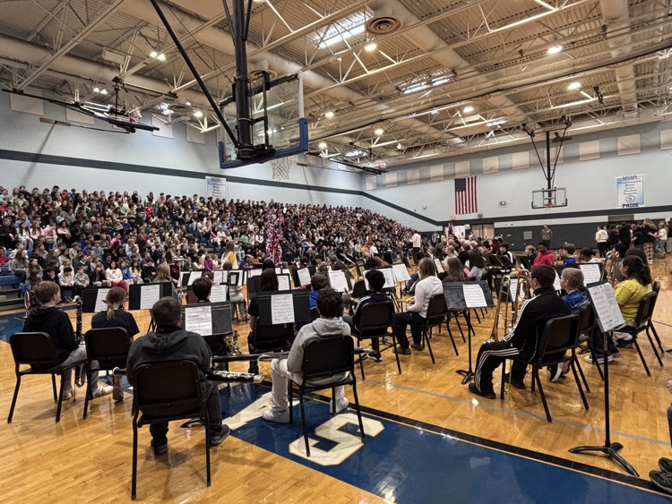 a shot of the whole gym with the student body