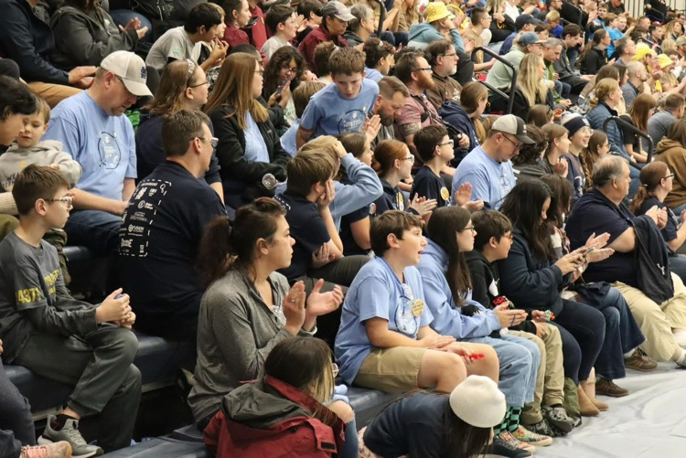 the team in the crowd at the competition 