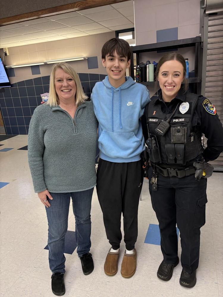 donor, student, and officer celebrating gift card win