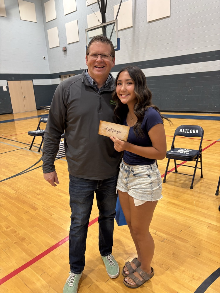 buckle in driving academy with winner of drivers training