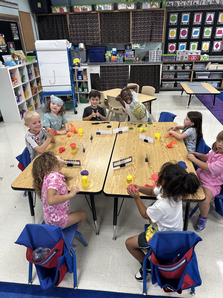 Practicing names with PlayDoh.