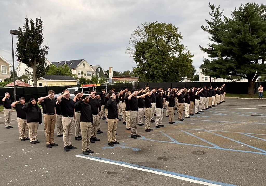 Students Salute the Flag at a 9/11 Remembrance