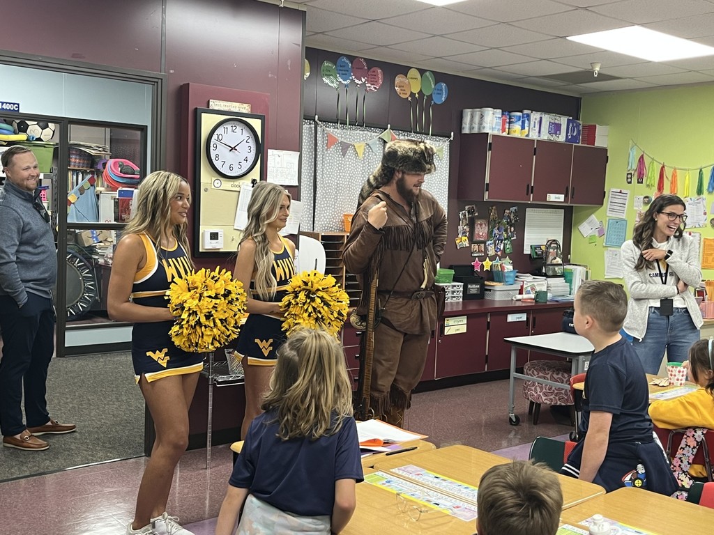 Our Kindergarten and 1st grade students got a special visit from th e WVU mountaineer and cheerleaders!