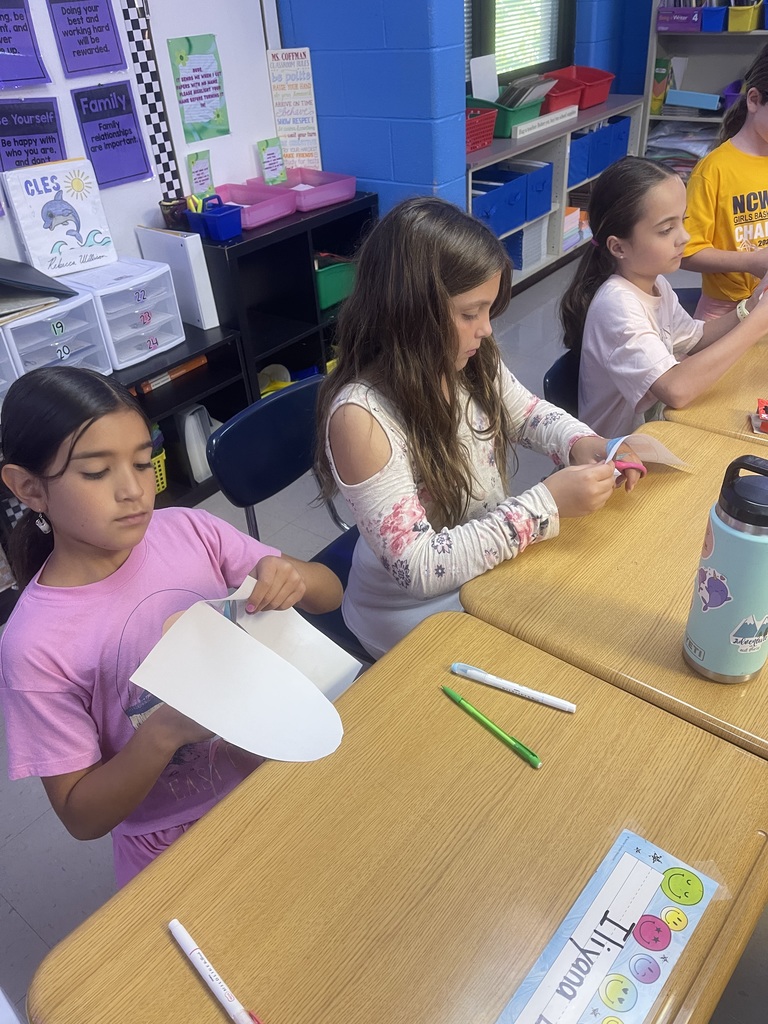 Fourth-grade students created remembrance ribbons in honor of 9/11 today.
