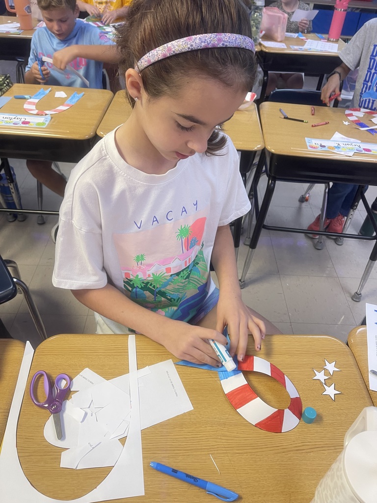 Fourth-grade students created remembrance ribbons in honor of 9/11 today.
