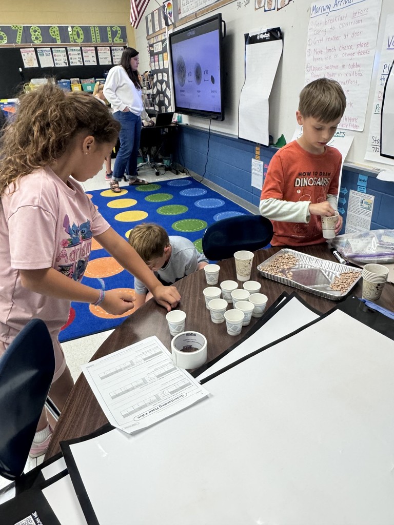 Counting beans to practice place value