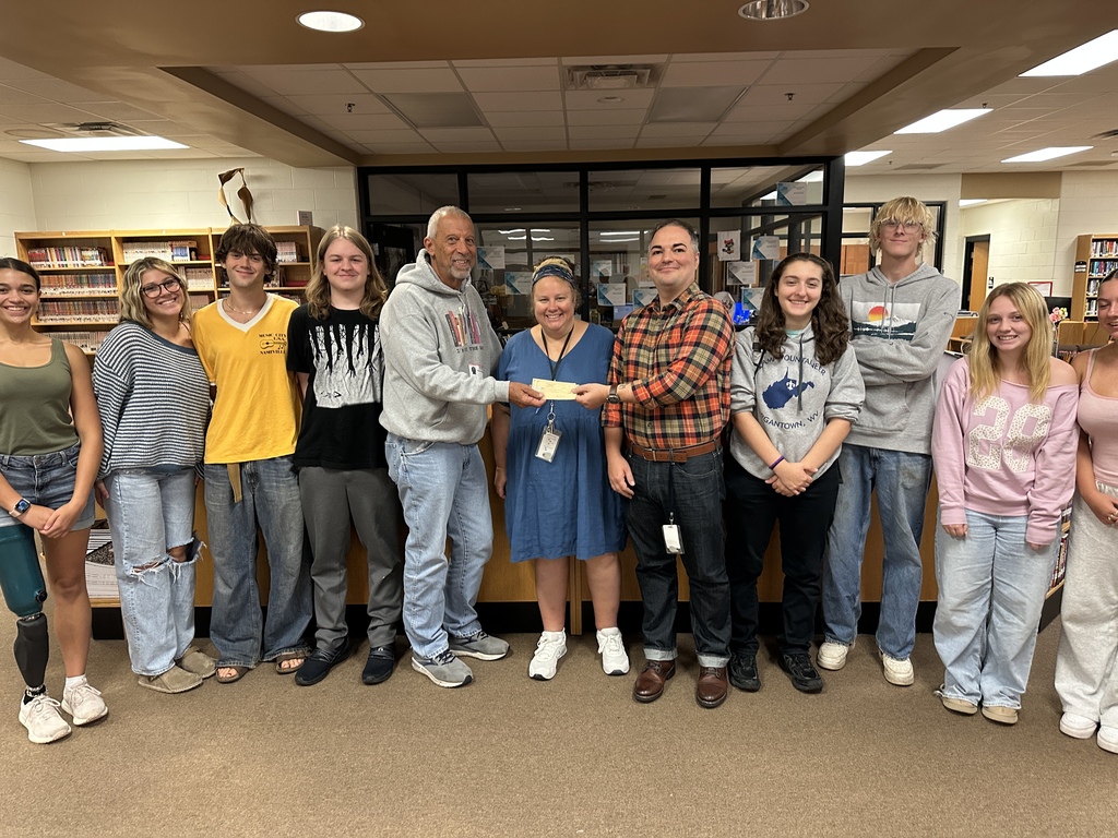picture of students receiving grant funds