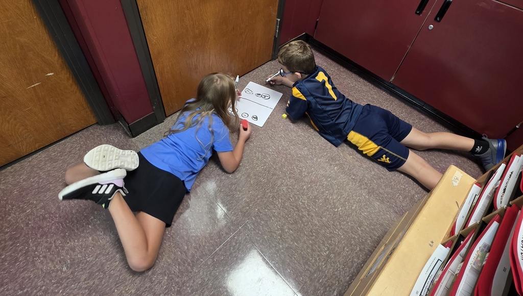 Mrs. Redman's class has been working on comparing numbers to 5 with a fun partner game!