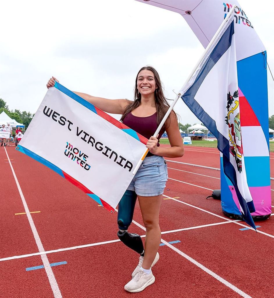 student holding a flag