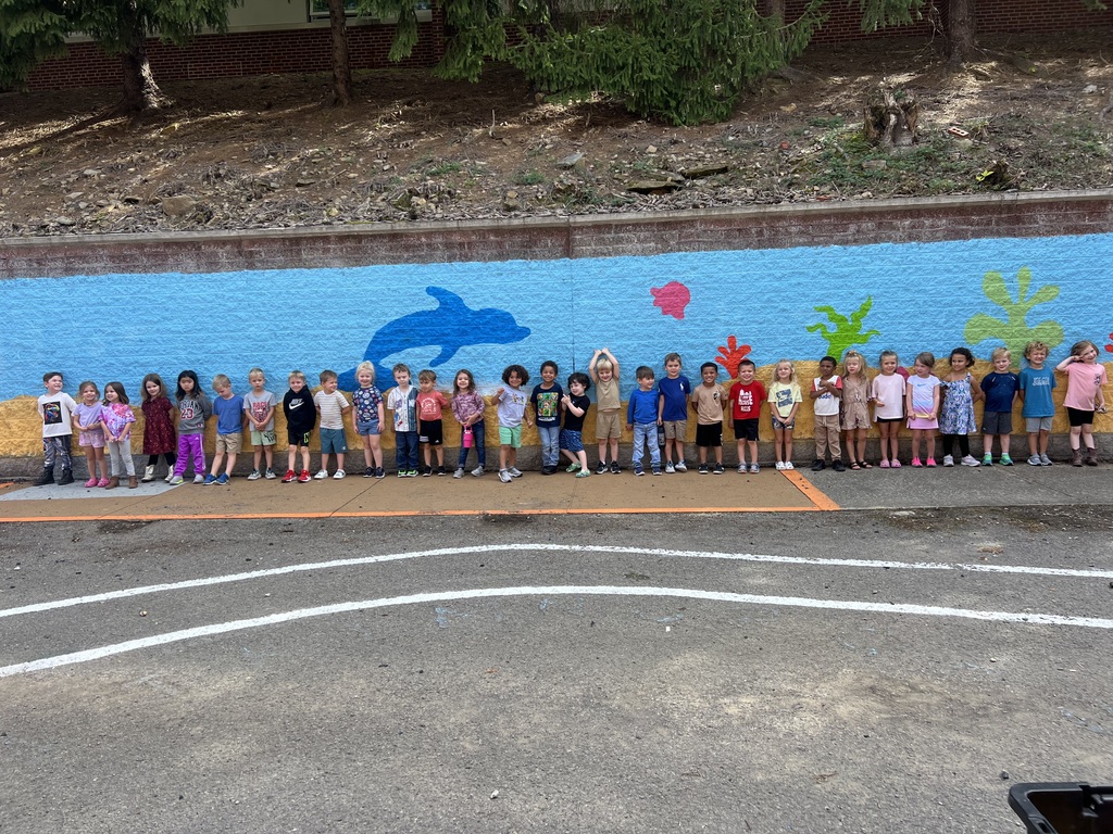 Ms. Gyorko and Mrs. Myers Pre-K classes show off the new mural on their playground!