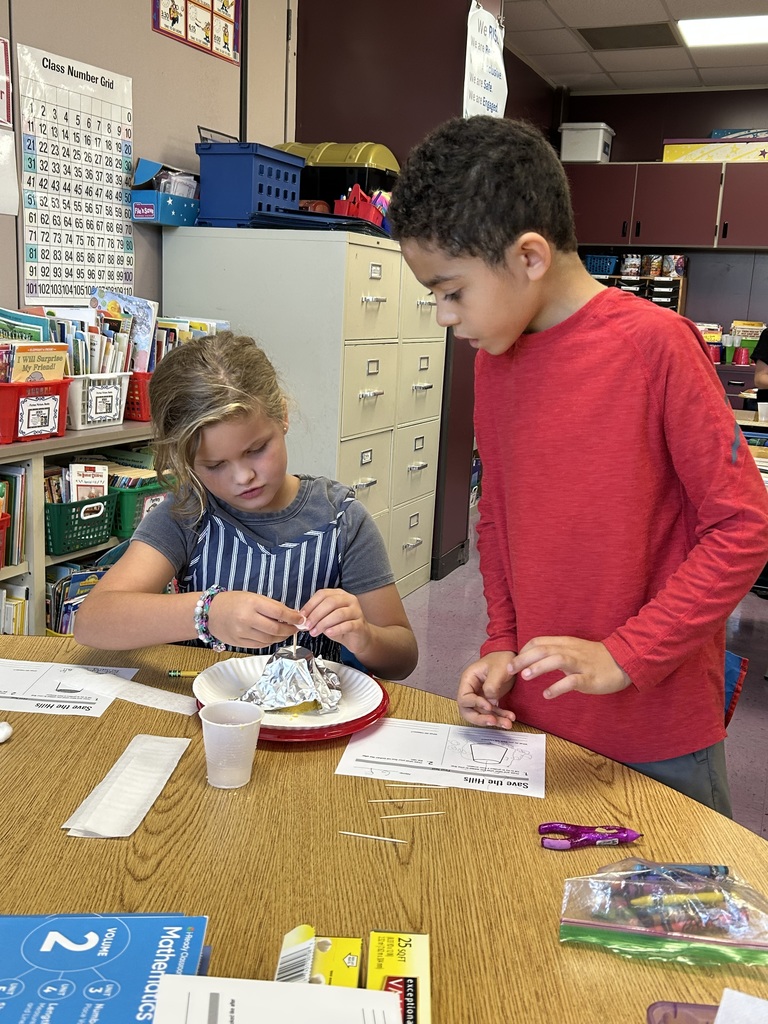 Fun with science: Students designed ways to prevent erosion!